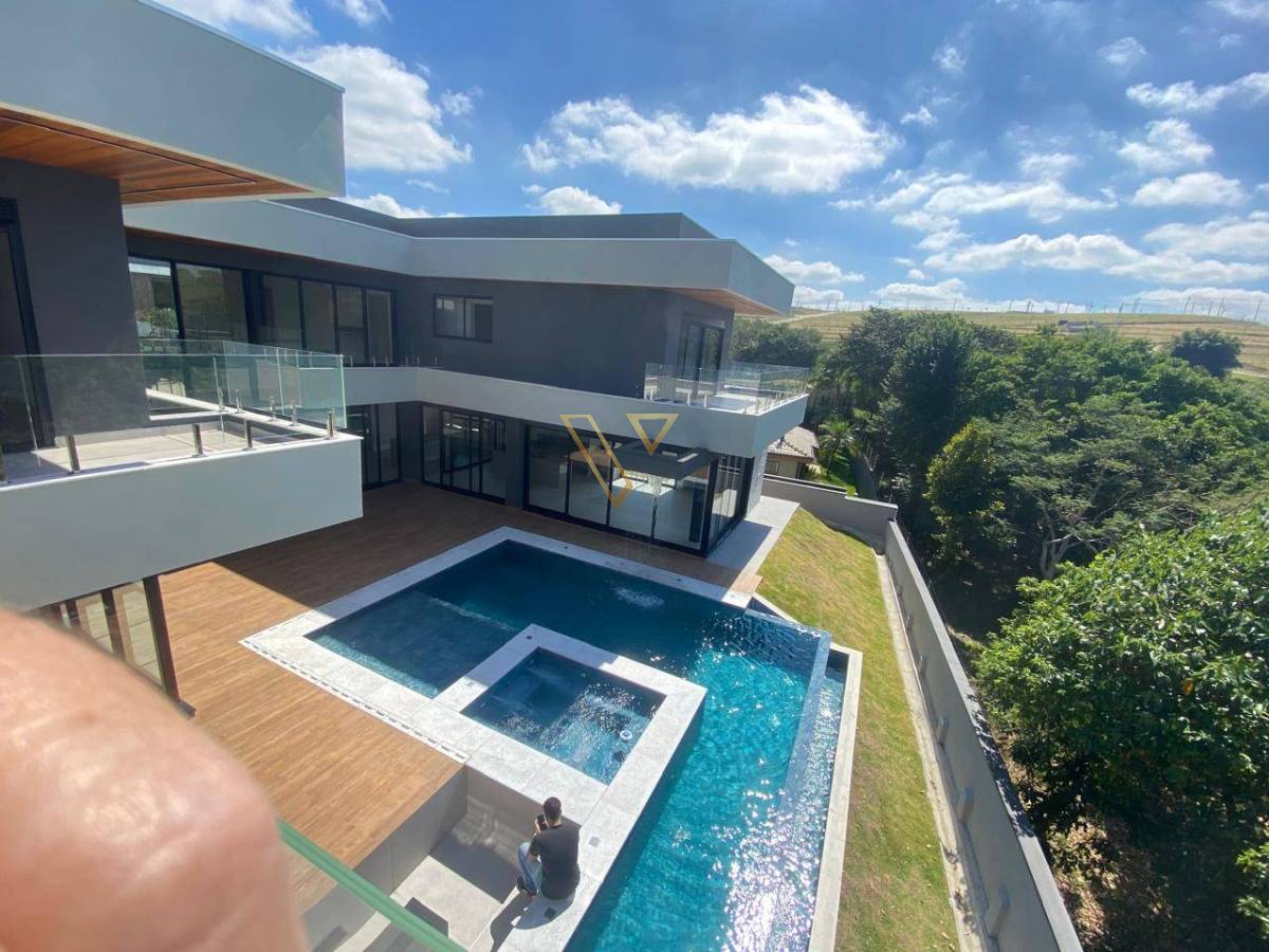 Residência de alto padrão que combina elegância, tecnologia e bem-estar no Reserva do Parathey Norte . - Vex Imóveis