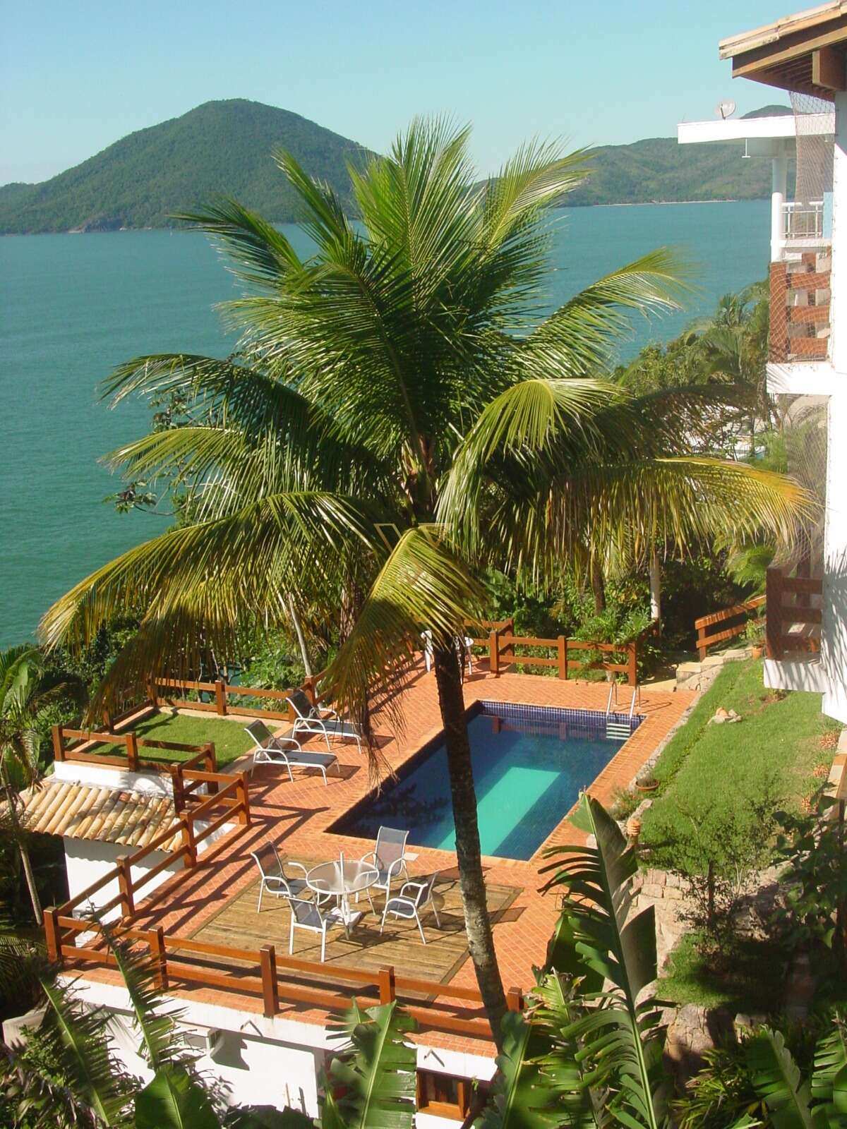 Residência Luxuosa  no Condomínio Ponta das Toninhas , com Vista Panorâmica para o Mar e Ilha Anchieta -Ubatuba -SP - Vex Imóveis