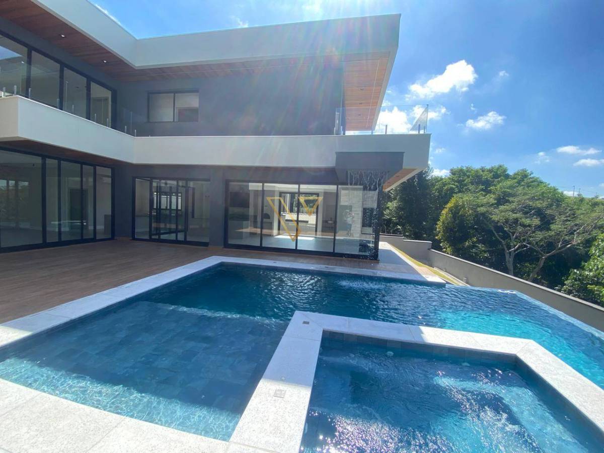 Residência de alto padrão que combina elegância, tecnologia e bem-estar no Reserva do Parathey Norte . - Vex Imóveis