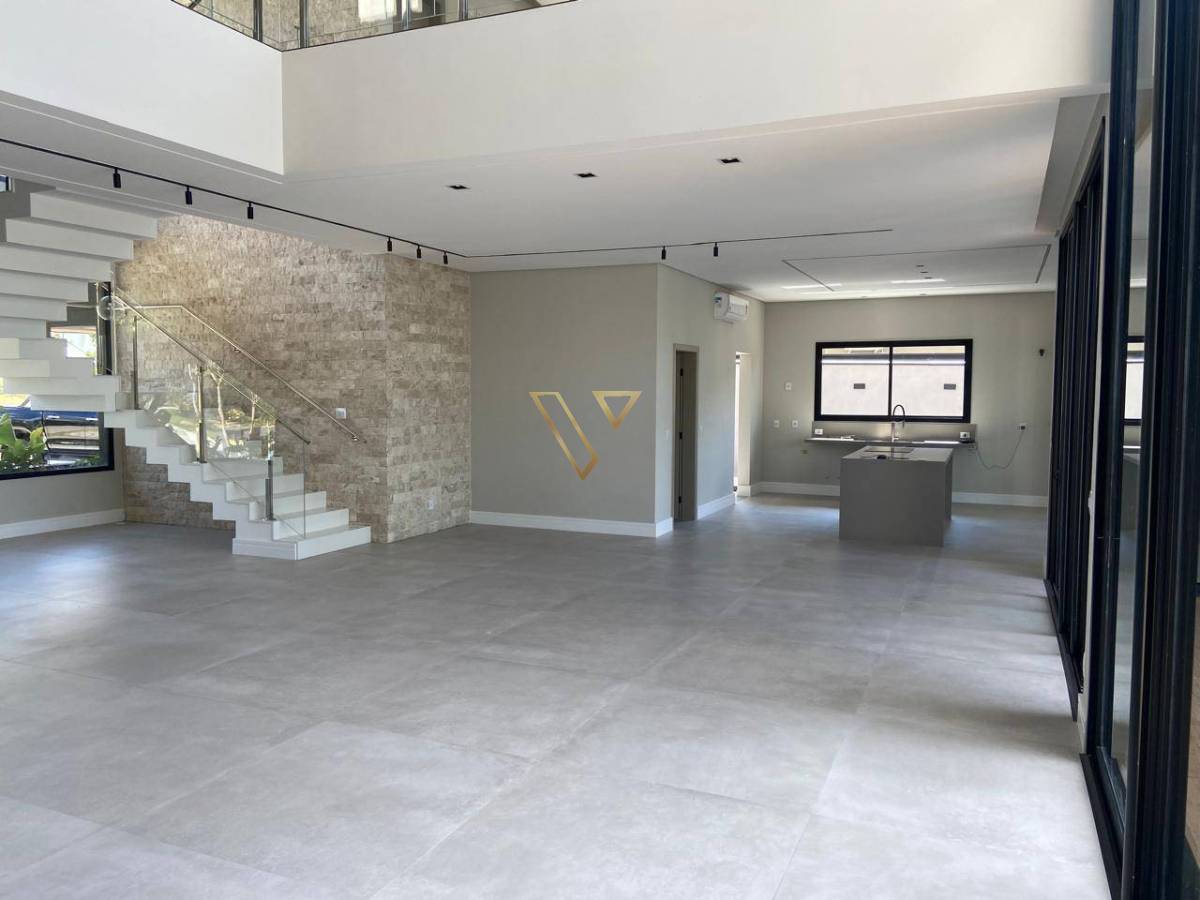 Residência de alto padrão que combina elegância, tecnologia e bem-estar no Reserva do Parathey Norte . - Vex Imóveis